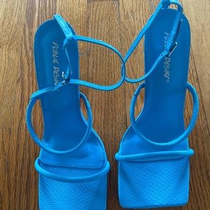 Blue strappy heels